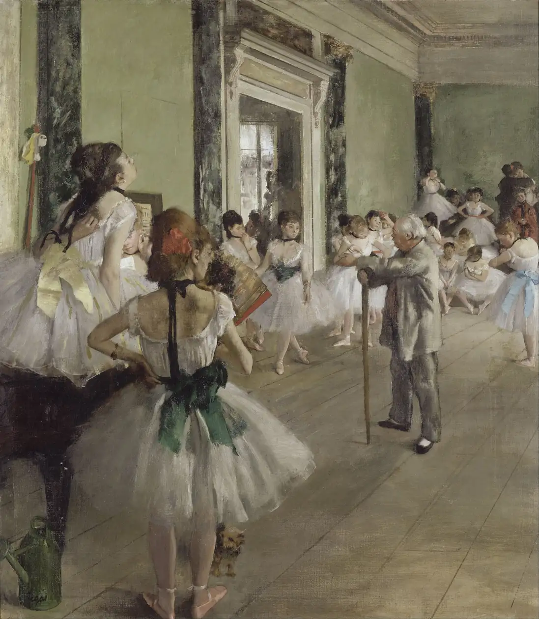 Young dancers practising in a rehearsal room while a teacher leans on his cane
