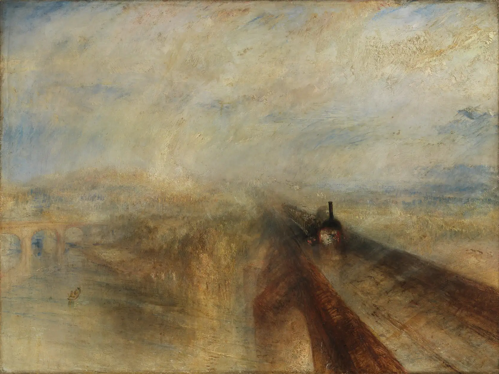 A steam train crossing a bridge through rain and haze